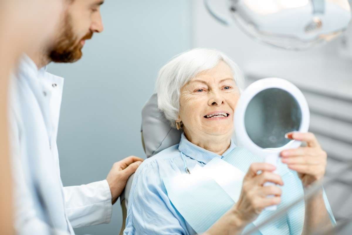 Struggling With Bad Breath From Missing Teeth? Try a Dental Implant